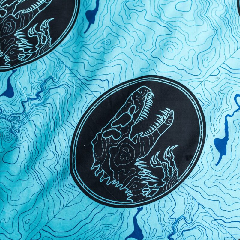 Blauw overtrek van Jurassic World - Tracker Glow in the Dark - 100% katoen